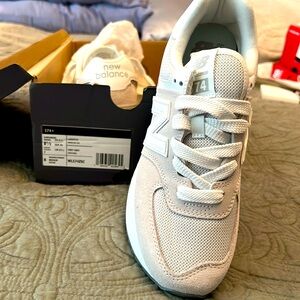 New Balance 574 Women’s  8.5W Men’s 7M stone color. New in Box